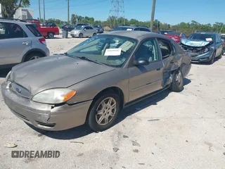 2006 Ford Taurus SE with VIN 1FAFP53U96A223924, listed as a IAAI auction lot 41828443 with 114,653 mi miles. Bid and sale history available at carsss.com. Image 2.