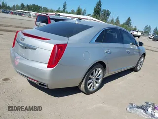 2017 Cadillac XTS Luxury with VIN 2G61M5S35H9159629, listed as a IAAI auction lot 42432936 with 220,985 mi miles and . Bid and sale history available at DreamBid. Image 4.