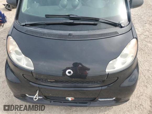2009 Smart fortwo Pure z VIN WMEEJ31XX9K269982, wystawiony jako Copart lot #59214215 z przebiegiem 99 711 mil mil oraz Tytuł czysty. Historia ofert i sprzedaży dostępna na DreamBid. Obrazek 11.