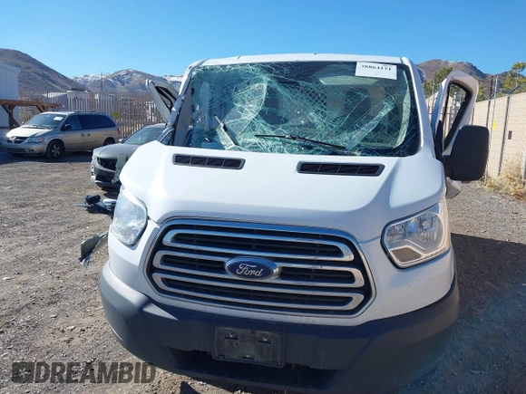2016 Ford Transit Cargo with VIN 1FTYR1ZM9GKB20351, listed as a IAAI auction lot 38864121 with 99,365 mi miles and . Bid and sale history available at DreamBid. Image 12.