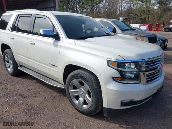 2015 Chevrolet Tahoe LTZ with VIN 1GNSCCKC2FR140524, listed as a IAAI auction lot 41592878 with 284,785 mi miles. Bid and sale history available at carsss.com. Image 1.