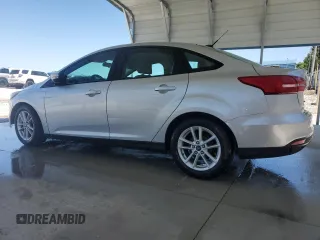 2016 Ford Focus SE with VIN 1FADP3F27GL336945, listed as a Copart auction lot 57811575 with 134,015 mi miles and Salvage title. Bid and sale history available at DreamBid. Image 2.