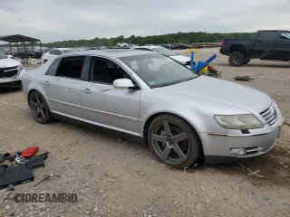 2004 Volkswagen Phaeton V8 z VIN WVWAF63D848008231, wystawiony jako Copart lot #58247645 z przebiegiem 130 457 mil mil oraz Czysty tytuł • Clean title. Historia ofert i sprzedaży dostępna na DreamBid. Obrazek 4.