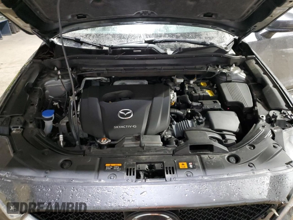 2021 Mazda CX-5 Grand Touring with VIN JM3KFADM5M0428282, listed as a Copart auction lot 42567825 with 33,763 mi miles and Salvage Title. Bid and sale history available at carsss.com. Image 14.