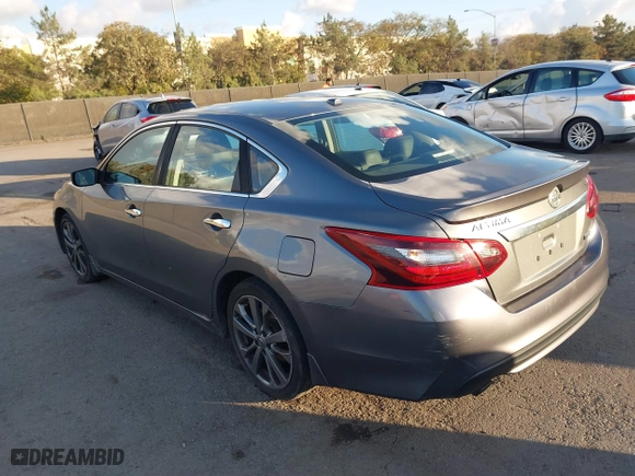 2018 Nissan Altima 2.5 SV with VIN 1N4AL3AP0JC136126, listed as a IAAI auction lot 41431759 with 170,825 mi miles. Bid and sale history available at carsss.com. Image 3.