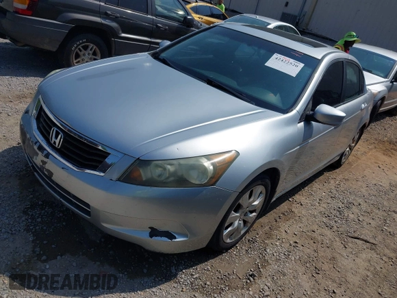 2009 Honda Accord EX with VIN 1HGCP267X9A123855, listed as a IAAI auction lot 42422520 with 198,903 mi miles and . Bid and sale history available at DreamBid. Image 2.