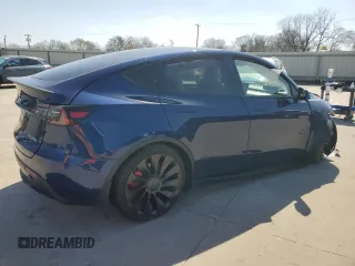 2023 Tesla Model Y Performance with VIN 7SAYGDEF5PF917808, listed as a Copart auction lot 48348615 with Not Provided miles and Salvage Title. Bid and sale history available at DreamBid. Image 3.