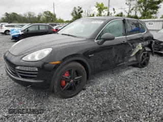 2014 Porsche Cayenne S Hybrid with VIN WP1AE2A29ELA50191, listed as a Copart auction lot 52142275 with 169,332 mi miles and Salvage title. Bid and sale history available at DreamBid. Image 1.