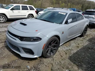 2020 Dodge Charger Scat Pack with VIN 2C3CDXGJ2LH232208, listed as a Copart auction lot 48927195 with 52,759 mi miles and Salvage Title. Bid and sale history available at carsss.com. Image 1.
