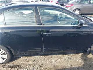 2017 Volkswagen Jetta 1.4T S with VIN 3VW167AJ4HM333245, listed as a IAAI auction lot 41582993 with 121,874 mi miles. Bid and sale history available at carsss.com. Image 13.