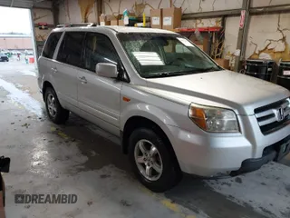2008 Honda Pilot EX-L with VIN 5FNYF18518B057487, listed as a IAAI auction lot 41922033 with 131,962 mi miles. Bid and sale history available at carsss.com. Image 1.