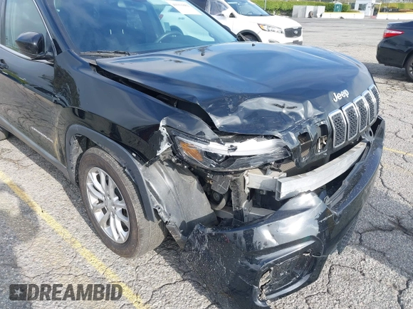 2019 Jeep Cherokee Latitude with VIN 1C4PJLCB8KD215423, listed as a IAAI auction lot 41911882 with 76,965 mi miles. Bid and sale history available at carsss.com. Image 6.