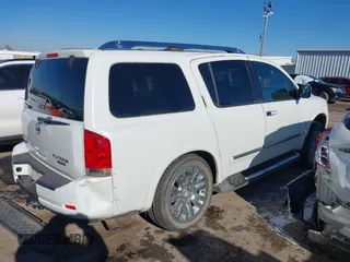 2015 Nissan Armada Platinum z VIN 5N1BA0NF7FN611136, wystawiony jako IAAI lot #41375085 z przebiegiem 130 819 mil mil oraz . Historia ofert i sprzedaży dostępna na DreamBid. Obrazek 4.