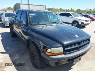 2003 Dodge Dakota Sport with VIN 1D7HL38X63S228581, listed as a IAAI auction lot 41835200 with 273,562 mi miles. Bid and sale history available at carsss.com. Image 1.
