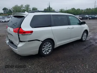 2014 Toyota Sienna Limited z VIN 5TDDK3DC4ES081882, wystawiony jako IAAI lot #42270167 z przebiegiem 58 723 mil mil oraz . Historia ofert i sprzedaży dostępna na DreamBid. Obrazek 4.