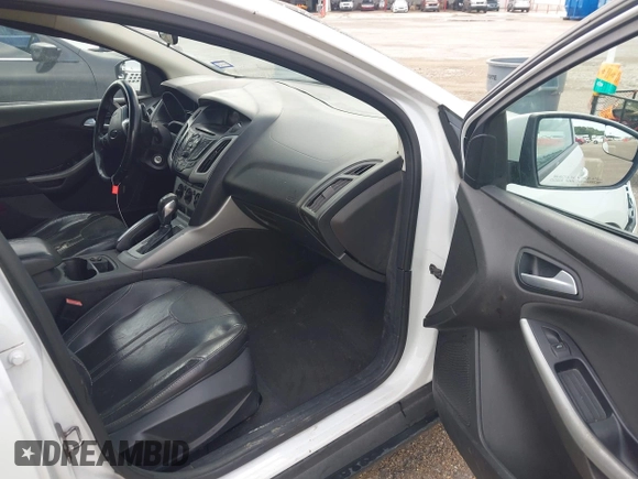 2013 Ford Focus SE with VIN 1FADP3F24DL302263, listed as a IAAI auction lot 42672666 with 207,805 mi miles and . Bid and sale history available at DreamBid. Image 5.