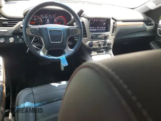 2016 GMC Yukon Denali with VIN 1GKS2CKJ5GR282446, listed as a Copart auction lot 68660254 with 122,751 mi miles and Salvage Title. Bid and sale history available at carsss.com. Image 8.