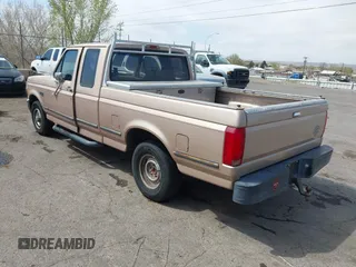 1996 Ford F-150 with VIN 1FTEX15H9TKA25252, listed as a IAAI auction lot 41881908 with 161,371 mi miles. Bid and sale history available at carsss.com. Image 3.