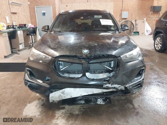 2020 BMW X1 xDrive28i with VIN WBXJG9C07L5P71792, listed as a IAAI auction lot 41583132 with 150,095 mi miles. Bid and sale history available at carsss.com. Image 6.
