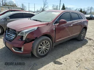 2017 Cadillac XT5 Luxury FWD z VIN 1GYKNBRS7HZ236673, wystawiony jako Copart lot #53944065 z przebiegiem 143 645 mil mil oraz Tytuł czysty. Historia ofert i sprzedaży dostępna na DreamBid. Obrazek 1.