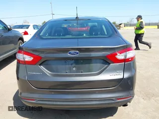 2016 Ford Fusion SE Hybrid with VIN 3FA6P0LU9GR405097, listed as a IAAI auction lot 42000535 with 58,293 mi miles. Bid and sale history available at carsss.com. Image 16.
