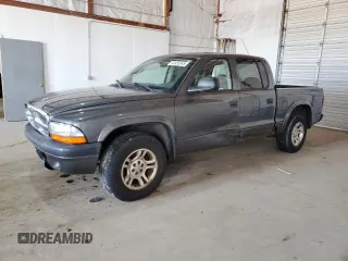 2004 Dodge Dakota Sport z VIN 1D7HL38N54S536938, wystawiony jako Copart lot #52455345 z przebiegiem 157 791 mil mil oraz Szkody całkowita. Historia ofert i sprzedaży dostępna na DreamBid. Obrazek 1.