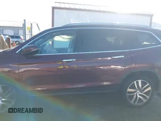 2016 Honda Pilot Touring with VIN 5FNYF6H90GB126572, listed as a IAAI auction lot 41872113 with 94,318 mi miles. Bid and sale history available at carsss.com. Image 14.
