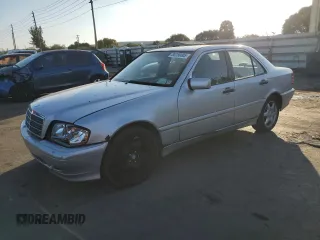 2000 Mercedes-Benz C 230/260/280/320 with VIN WDBHA29GXYA853571, listed as a Copart auction lot 88280005 with 128,523 mi miles and Salvage Title. Bid and sale history available at carsss.com. Image 1.