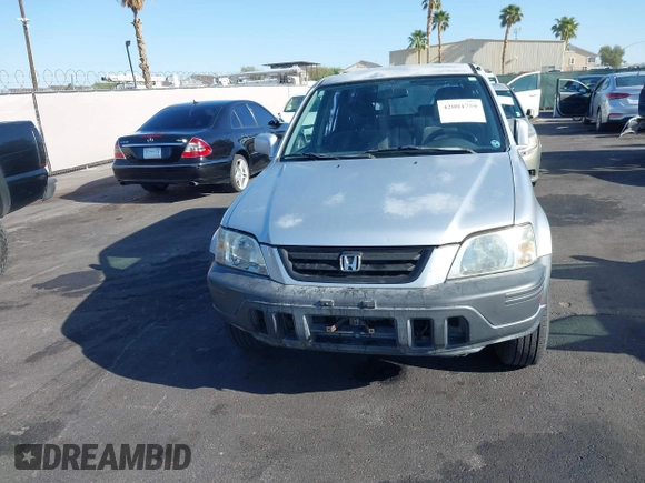 1999 Honda CR-V EX with VIN JHLRD1861XC007657, listed as a IAAI auction lot 42004759 with 180,078 mi miles. Bid and sale history available at carsss.com. Image 12.