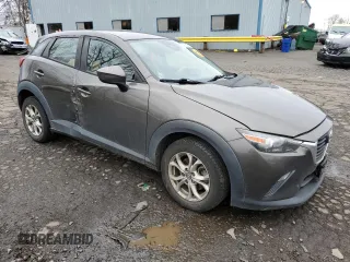 2018 Mazda CX-3 Sport z VIN JM1DKFB77J0312732, wystawiony jako Copart lot #45720065 z przebiegiem 99 866 mil mil oraz Szkoda całkowita • Salvage title. Historia ofert i sprzedaży dostępna na DreamBid. Obrazek 4.