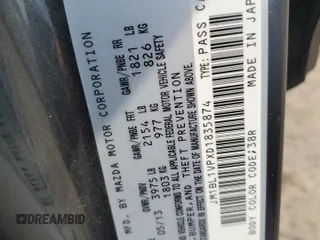2013 Mazda 3 i Touring with VIN JM1BL1VPXD1835874, listed as a Copart auction lot 59709455 with 101,602 mi miles and Salvage title. Bid and sale history available at DreamBid. Image 12.