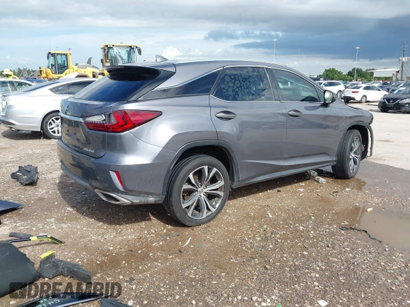 2016 Lexus RX 350 z VIN 2T2ZZMCA3GC012972, wystawiony jako IAAI lot #42686964 z przebiegiem 139 771 mil mil oraz . Historia ofert i sprzedaży dostępna na DreamBid. Obrazek 4.