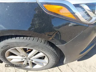 2015 Hyundai Sonata 2.4L SE with VIN 5NPE24AF9FH001329, listed as a IAAI auction lot 41854603 with 104,124 mi miles. Bid and sale history available at carsss.com. Image 6.