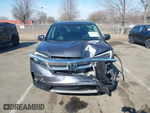 2021 Honda Pilot EX-L with VIN 5FNYF6H54MB028203, listed as a IAAI auction lot 41641116 with 46,755 mi miles and . Bid and sale history available at DreamBid. Image 12.