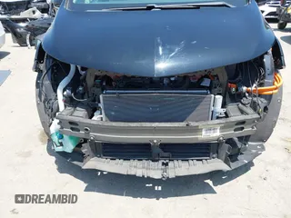 2020 Chevrolet Bolt EV LT z VIN 1G1FY6S07L4144203, wystawiony jako IAAI lot #42443911 z przebiegiem 41 666 mil mil oraz . Historia ofert i sprzedaży dostępna na DreamBid. Obrazek 6.