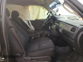 2013 Chevrolet Tahoe Commercial with VIN 1GNLC2E00DR304026, listed as a Copart auction lot 57041135 with 125,087 mi miles and Salvage title. Bid and sale history available at DreamBid. Image 7.