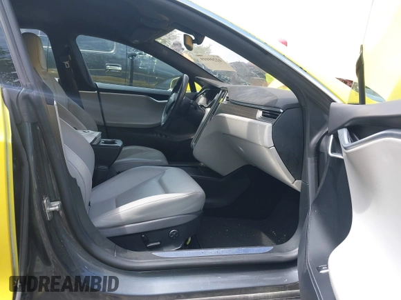 2016 Tesla Model S 70 kWh Battery with VIN 5YJSA1E14GF141579, listed as a IAAI auction lot 42209119 with 105,947 mi miles and . Bid and sale history available at carsss.com. Image 5.