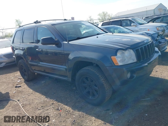 2007 Jeep Grand Cherokee Laredo with VIN 1J8GR48K77C582875, listed as a IAAI auction lot 42061653 with 259,767 mi miles. Bid and sale history available at carsss.com. Image 1.