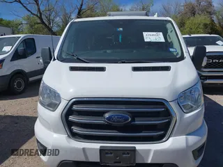 2020 Ford Transit Passenger XL with VIN 1FBAX2Y86LKA23463, listed as a IAAI auction lot 41848187 with 62,737 mi miles and . Bid and sale history available at DreamBid. Image 6.