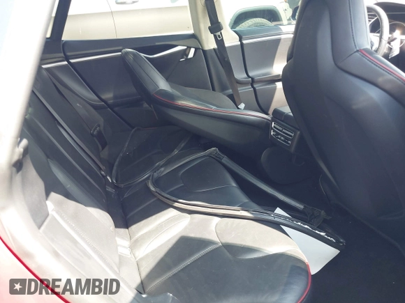 2013 Tesla Model S Performance with VIN 5YJSA1CP6DFP17689, listed as a IAAI auction lot 42483390 with 51,432 mi miles and . Bid and sale history available at DreamBid. Image 8.