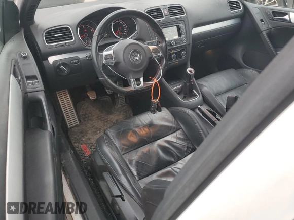 2012 Volkswagen GTI PZEV z VIN WVWED7AJ9CW107107, wystawiony jako Copart lot #43623155 z przebiegiem 193 560 mil mil oraz Szkoda całkowita • Salvage title. Historia ofert i sprzedaży dostępna na DreamBid. Obrazek 8.