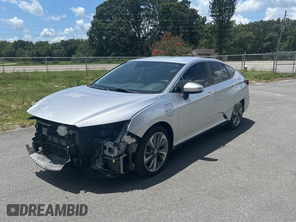2019 Honda Clarity z VIN JHMZC5F14KC002619, wystawiony jako Copart lot #60905205 z przebiegiem 53 911 mil mil oraz Szkoda całkowita • Salvage title. Historia ofert i sprzedaży dostępna na DreamBid. Obrazek 2.
