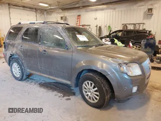 2010 Mercury Mariner Premier with VIN 4M2CN9HGXAKJ11983, listed as a IAAI auction lot 41512060 with 154,971 mi miles. Bid and sale history available at carsss.com. Image 1.