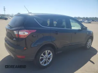 2017 Ford Escape SE with VIN 1FMCU9GD1HUD01956, listed as a Copart auction lot 53756995 with 132,809 mi miles and Clean Title. Bid and sale history available at DreamBid. Image 3.