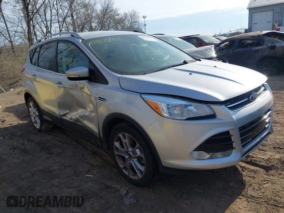 2015 Ford Escape Titanium z VIN 1FMCU0J91FUC41531, wystawiony jako IAAI lot #41903203 z przebiegiem 118 962 mil mil oraz . Historia ofert i sprzedaży dostępna na DreamBid. Obrazek 6.