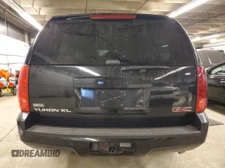 2007 GMC Yukon XL SLT z VIN 1GKFK16377J349144, wystawiony jako Copart lot #84300374 z przebiegiem Nie podano mil oraz Szkoda całkowita • Salvage title. Historia ofert i sprzedaży dostępna na DreamBid. Obrazek 6.
