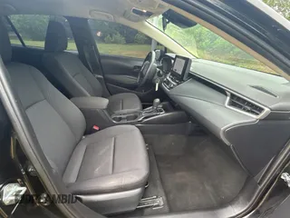2023 Toyota Corolla LE with VIN 5YFB4MDE3PP045556, listed as a Copart auction lot 55272035 with 32,319 mi miles and Clean Title. Bid and sale history available at carsss.com. Image 5.