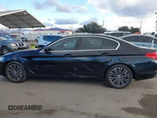 2019 BMW 5 Series 530i with VIN WBAJA5C54KWW45379, listed as a IAAI auction lot 41276092 with 77,025 mi miles. Bid and sale history available at carsss.com. Image 14.