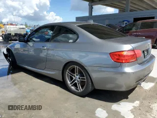 2011 BMW 3 Series 335is with VIN WBAKG1C52BE617713, listed as a Copart auction lot 74064204 with 132,742 mi miles and Salvage Title. Bid and sale history available at carsss.com. Image 2.