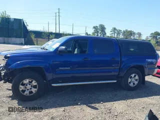 2014 Toyota Tacoma with VIN 3TMLU4EN4EM154261, listed as a IAAI auction lot 42119237 with 211,929 mi miles and . Bid and sale history available at DreamBid. Image 15.
